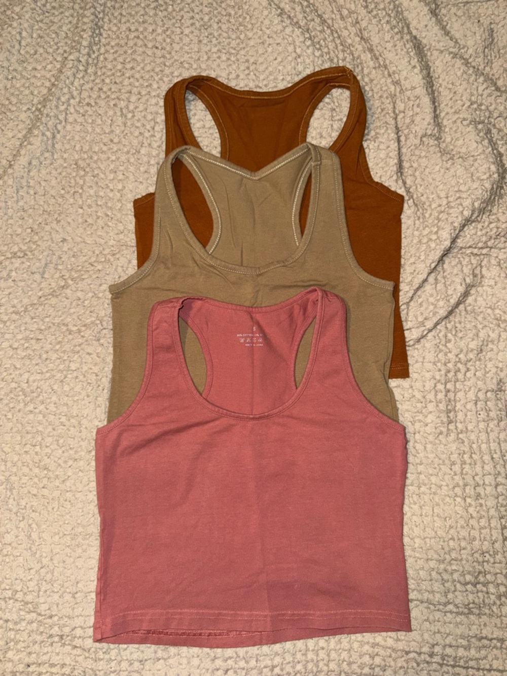 Three cotton cropped racerback tanks
